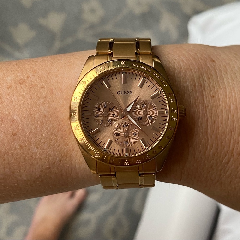 Rose gold guess watch